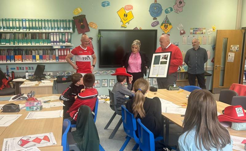 Michelle O’Neill presents Joe Biden-signed Seamus Heany poem to primary school