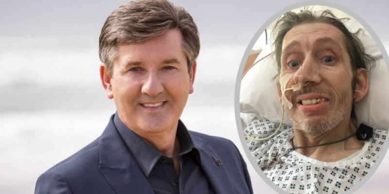 Shane MacGowan smiling after Daniel O'Donnell visits in hospital