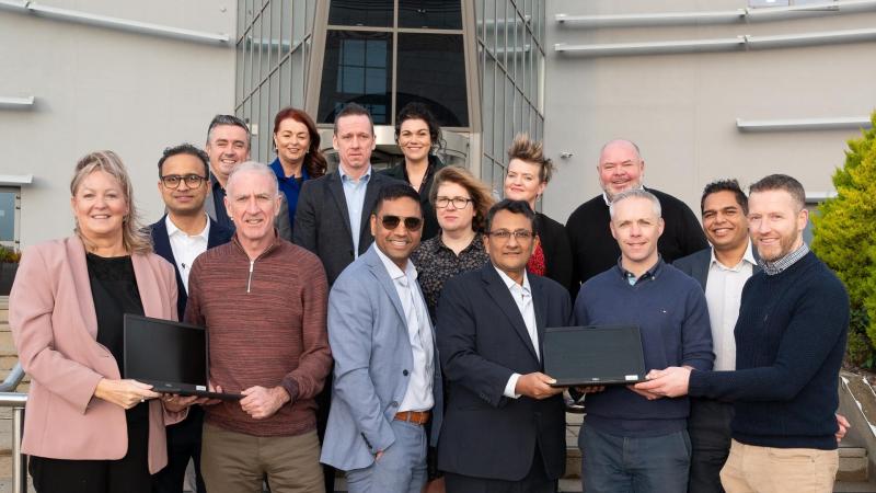 Senior TCS cybersecurity executives visit Letterkenny and present laptops to schools