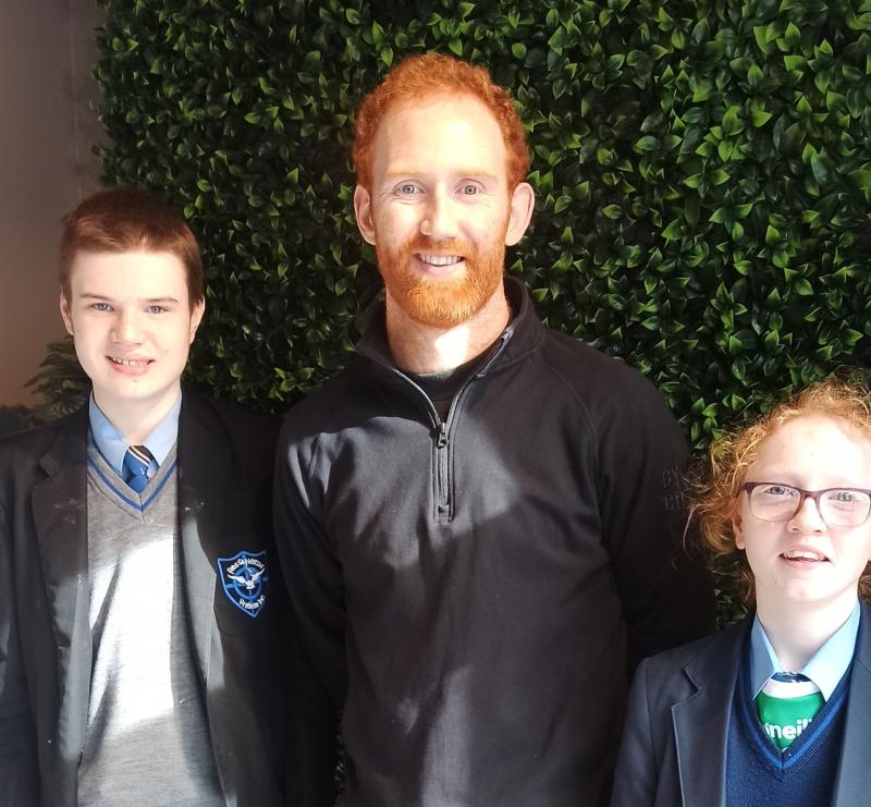 Derry GAA star Conor Glass visits his former school to offer advice to budding footballers