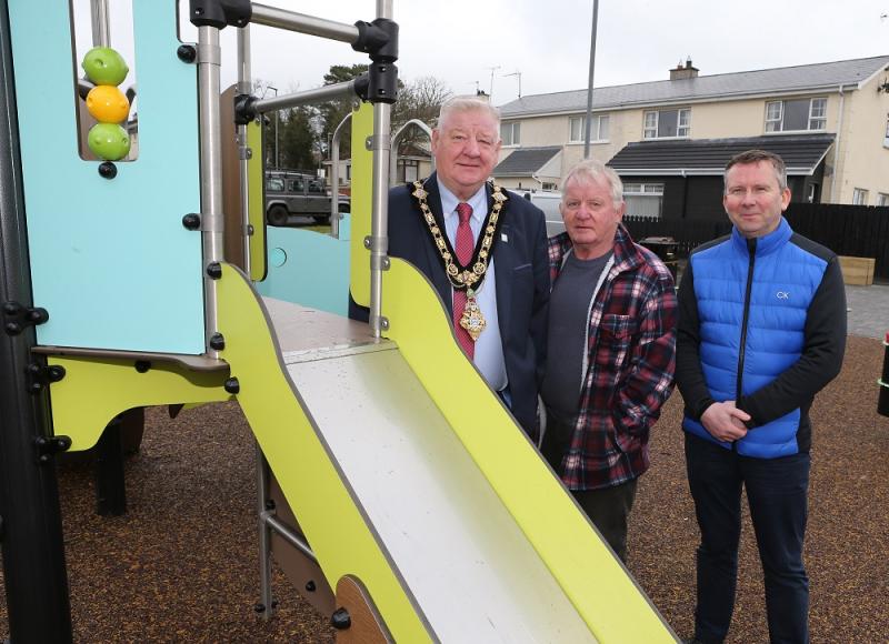 Pictured admiring the recent works at Glenullin Play Park - Mayor of Causeway Coast and Glens Councillor Steven Callaghan, Councillor Ciarán Archibald and Garry Cardwell, Council Funding Support Offic
