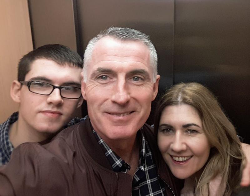 Fiachra Kearney (left) with his parents Declan and Cathy.