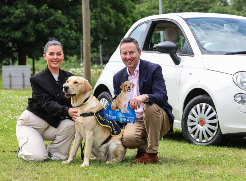 Pictured is influencer and campaign ambassador for Northern Ireland Roisin Doherty with Maxol CEO Brian Donaldson and guide dog puppy Leo