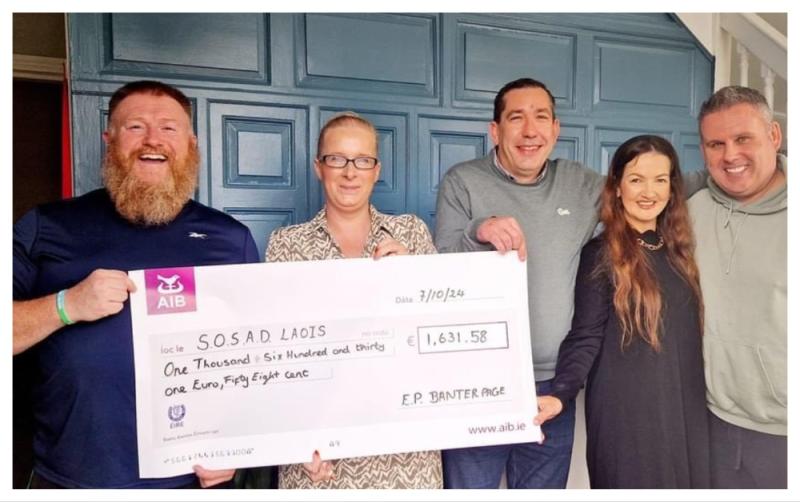 Electric Picnic Banter group present two mental health charities with cheques after Guinness World Record win