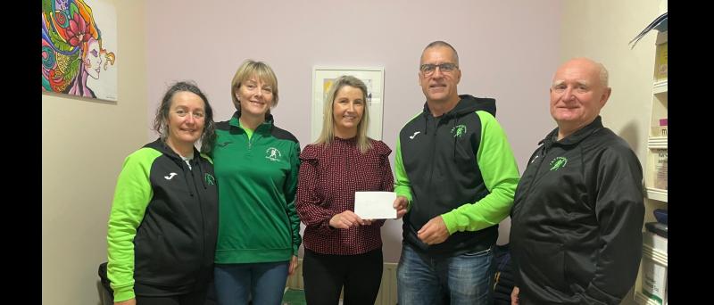 Athletics training group makes donation to women's refuge in Tipperary