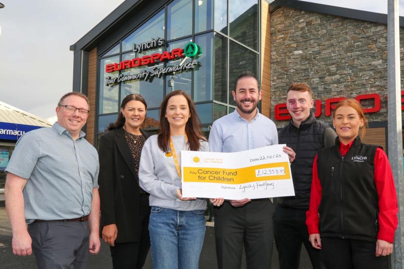 Derry retailer raise over £12,000 for local children’s cancer charity