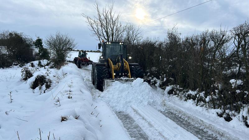 Laois IFA members clear snow and ice from local health centres