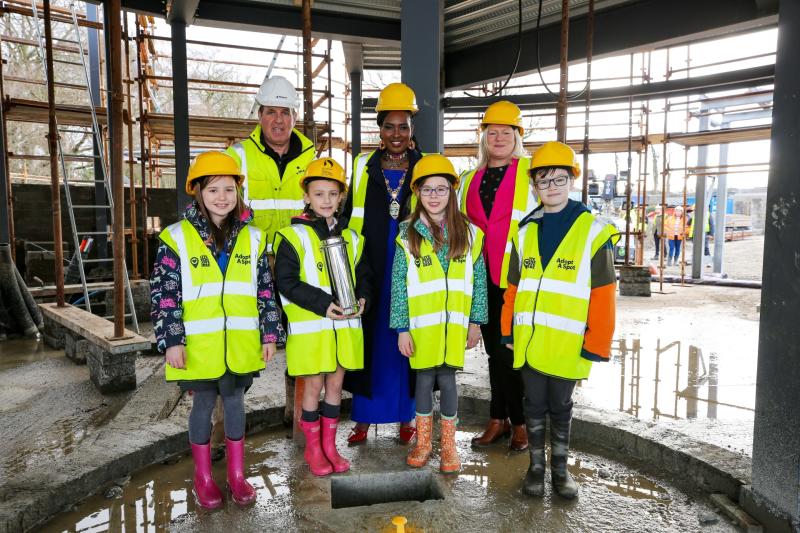 Local pupils place time capsule in Derry's new Acorn Farm dome