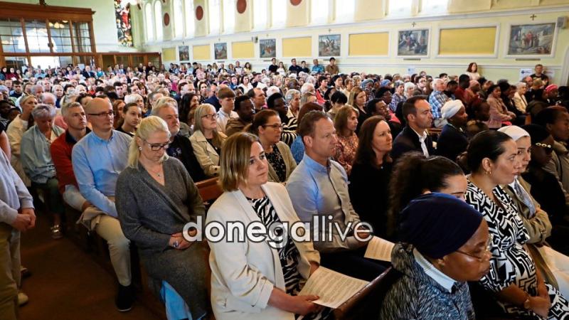 'A dark cloud over everybody': Hundreds attend vigil for Buncrana drowning victims