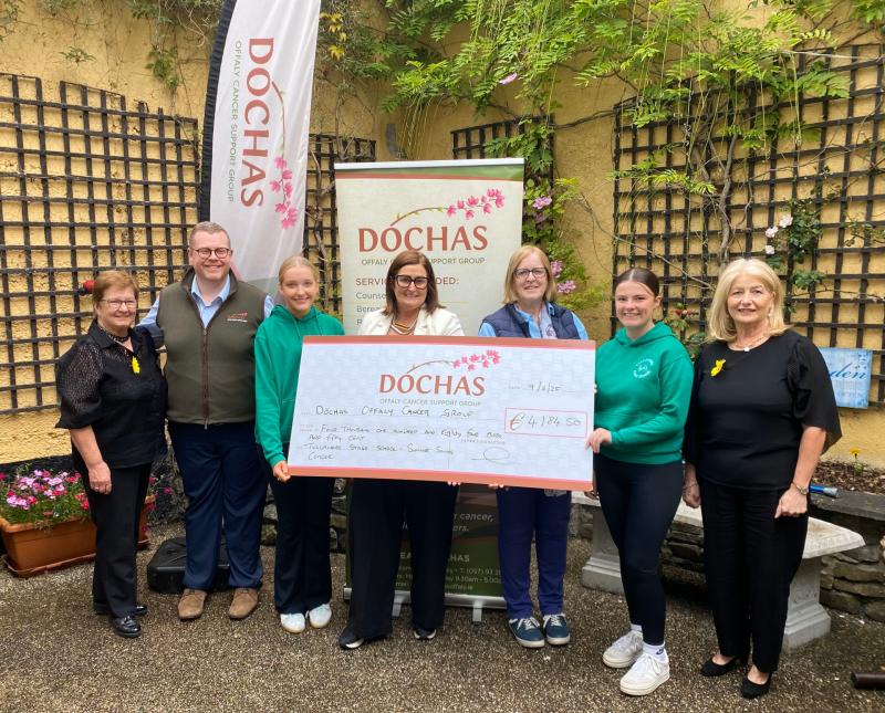 Members of Tullamore Stage School presenting a cheque for over four thousand euro to Dochas 