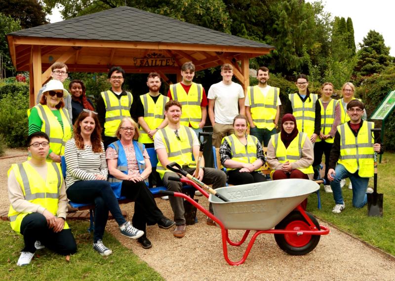 Laois business rolls up sleeves and volunteers with Abbeyleix Tidy Towns