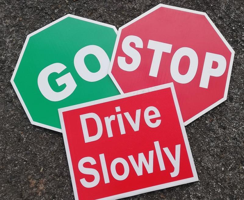 Stop and Go traffic management system operating on street in Tipperary village 