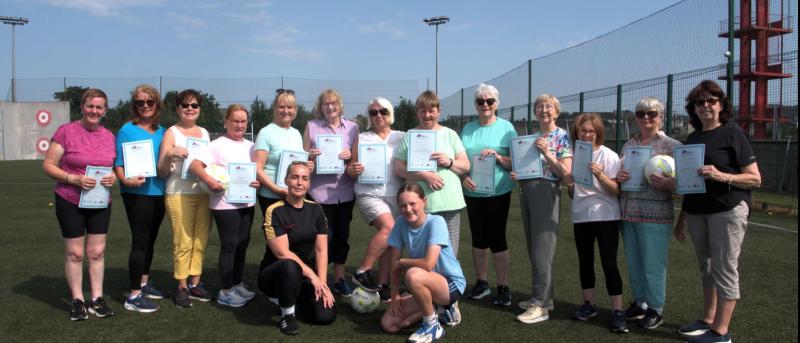 Carrick-on-Suir women's group members presented with football course certs 