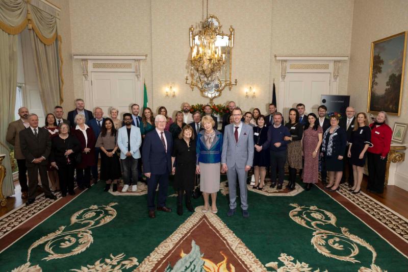 Áras reception for Laois parents who raised €50k for charity after loss of infant son
