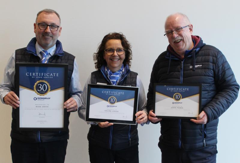 Over a century of service honoured at Donnelly Group Campsie