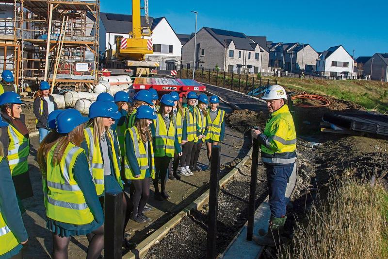 Derry students get behind-the-scenes look at new housing development