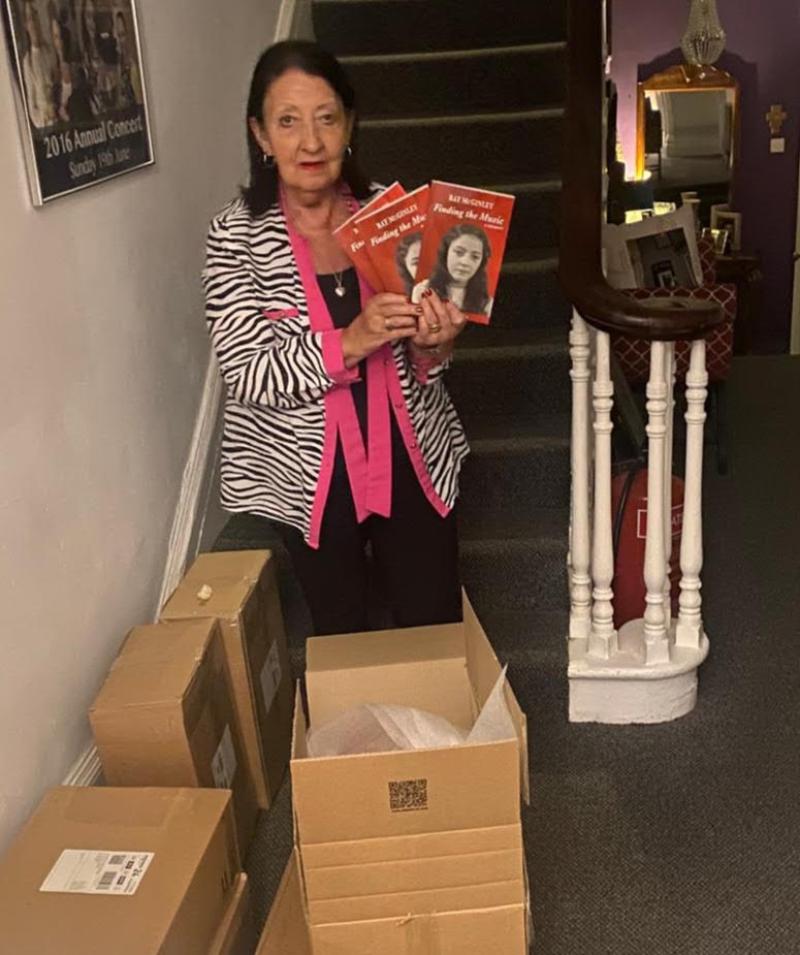 Ray McGinley with her newly published memoir, 'Finding the Music'.