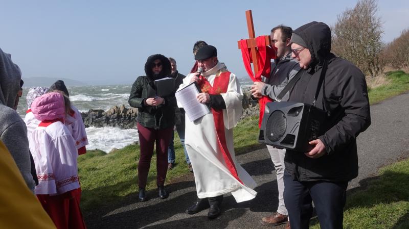 Large crowd attends annual Easter procession along blustery Buncrana coastline