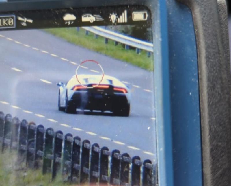 Driver of luxury sports car arrested for travelling  at more than 200km/h on busy road