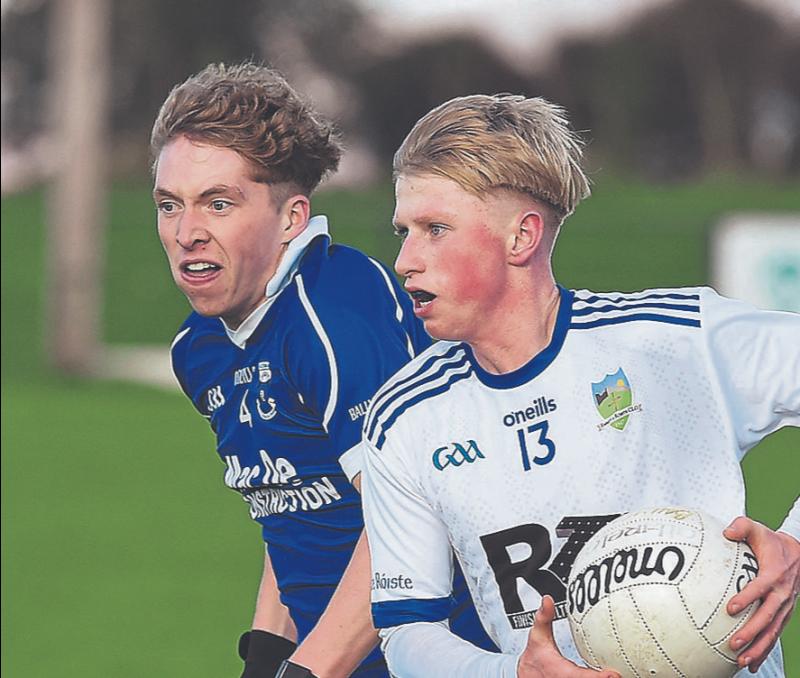DD Reilly Roche in full flight as he takes on Ballycommon,s Chulainn Boland in the AIB Club Championship game in Darver. ALL PHOTOS: ARTHUR KINAHAN