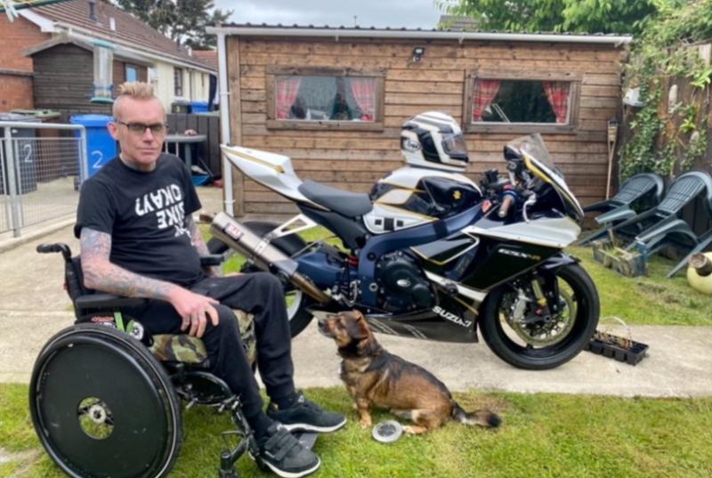 Derry man paralysed from ribs down says thank you as he takes to the saddle one last time