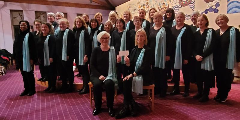 Tipperary's Belle Voci choir presents Christmas concert cheque to CARE Cancer Support Centre