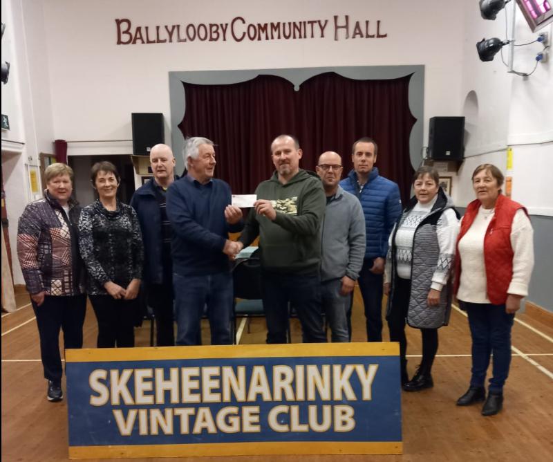 South Tipperary Vintage Club make presentation to support defibrillator upkeep at local hall