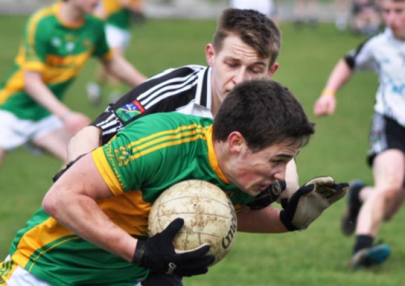 Clonmel Commercials goalscorer Liam Murchan in action against JK Brackens of Templemore.
