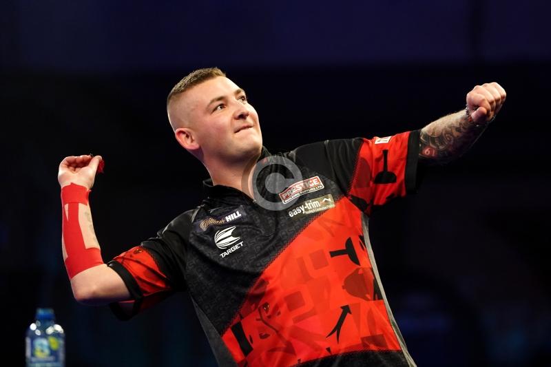Nathan Aspinall wins after playing through the pain at Alexandra Palace