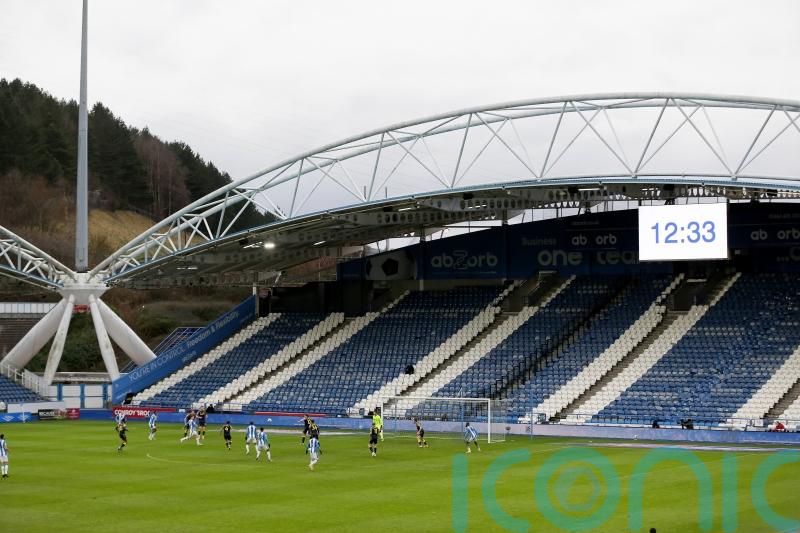 Former owner steps in as Huddersfield chief executive leaves club