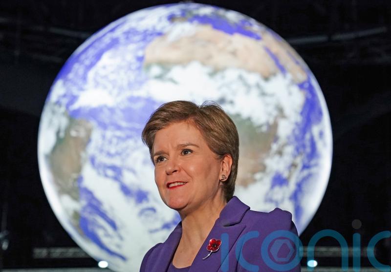 Nicola Sturgeon and Alister Jack both look forward to better times in 2022