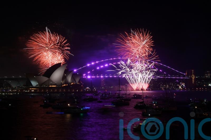 In Pictures: Muted New Year’s Eve celebrations around the world