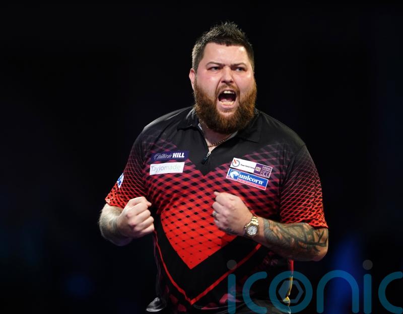 Michael Smith beats defending champion Gerwyn Price to book semi-final spot