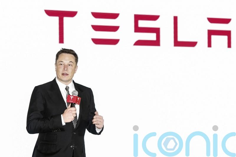 Activists call on Tesla to close new Xinjiang showroom