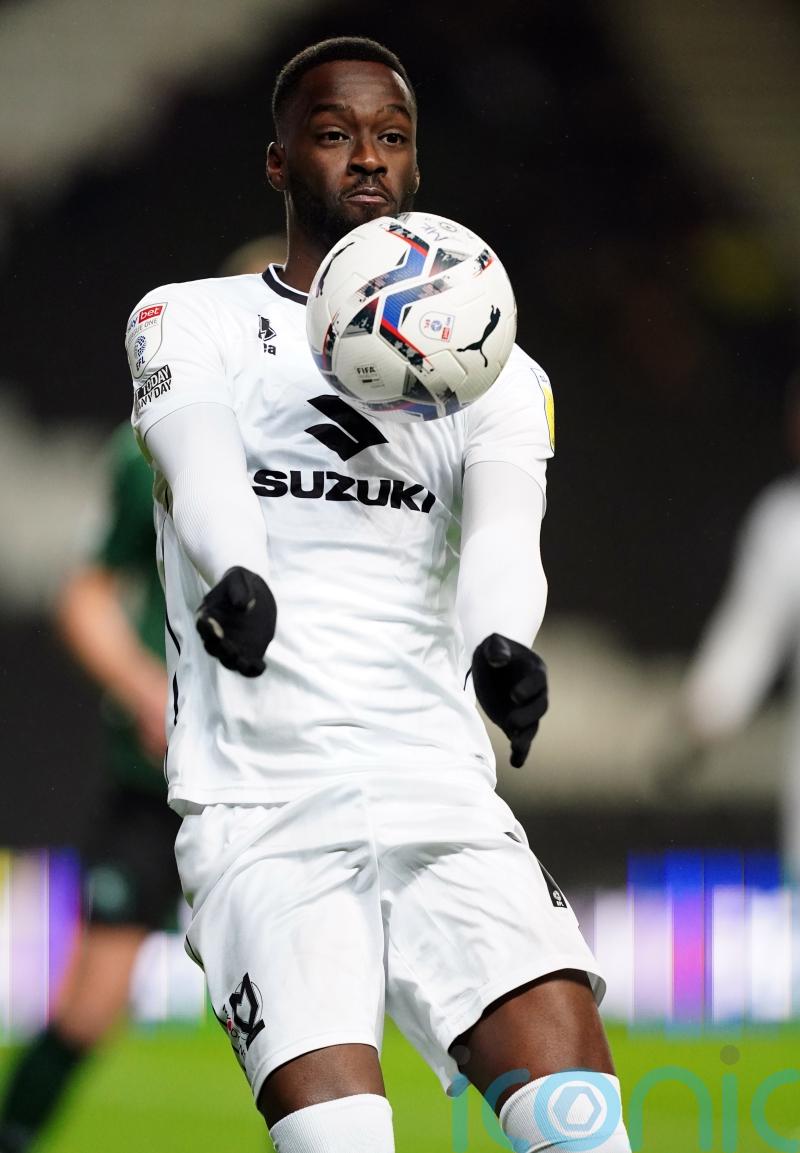 Accrington hold on with 10 men against MK Dons