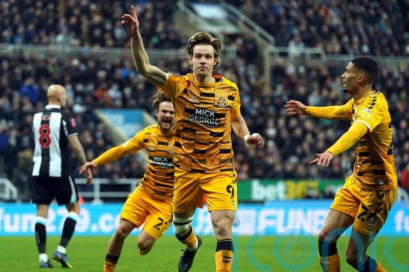 Cambridge shock Newcastle as Kidderminster conquer Reading in FA Cup third round
