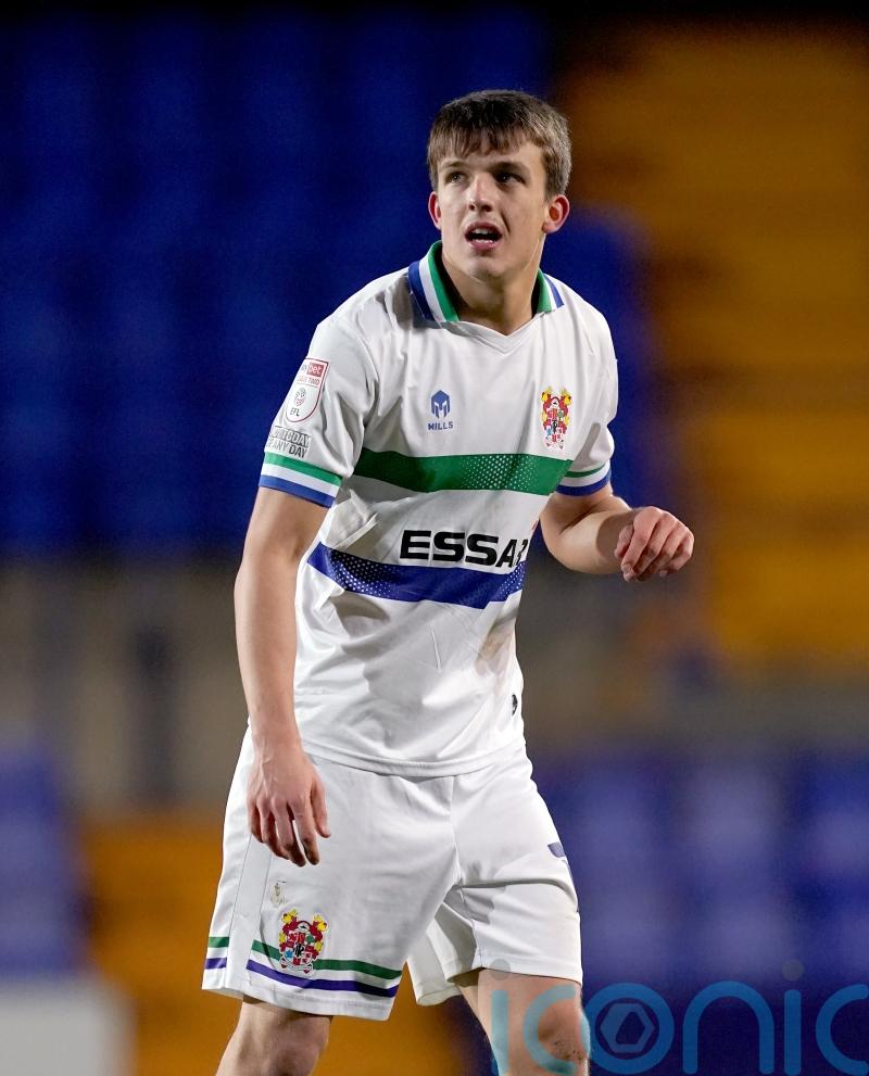 Tranmere score four past sorry Scunthorpe to move second in League Two