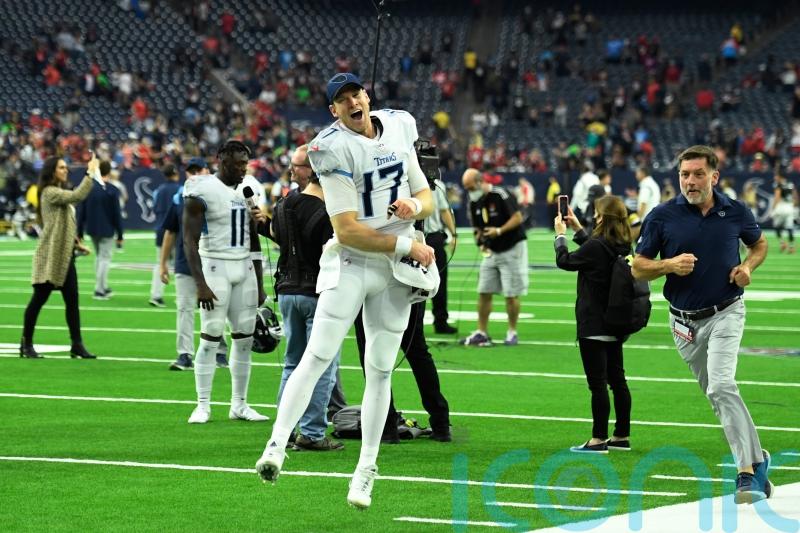 The Tennessee Titans beat the Houston Texans to clinch number one seed in AFC