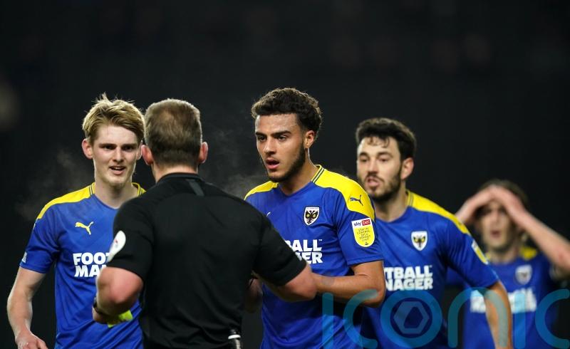 Nesta Guinness-Walker suspended as AFC Wimbledon take on Morecambe