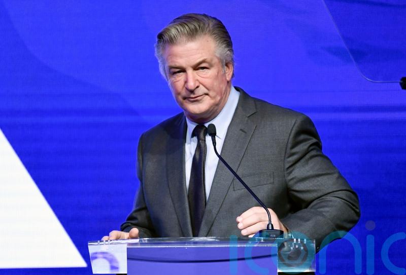 Alec Baldwin surrenders his phone in shooting investigation