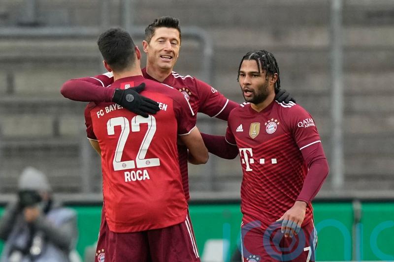 Robert Lewandowski nets hat-trick as Bayern Munich move six points clear at top