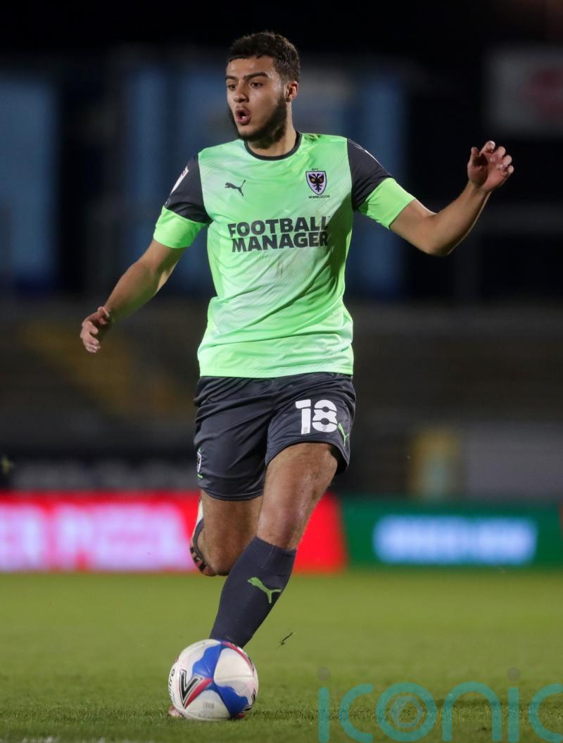 AFC Wimbledon welcome back Nesta Guinness-Walker against Portsmouth