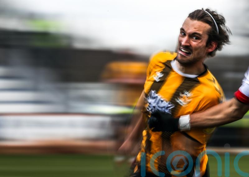 Harrison Dunk helps Cambridge down Doncaster