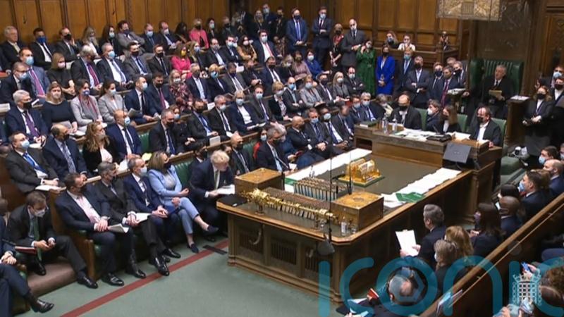 Boris Johnson faces repeated calls to quit during bruising PMQs session