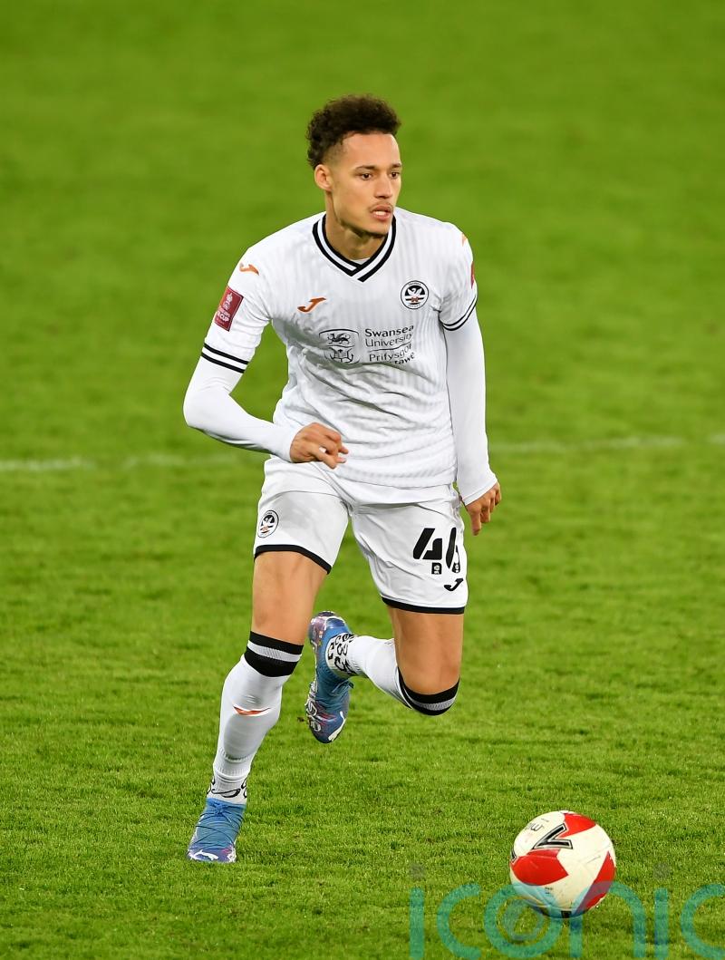 Rhys Williams returns to Liverpool after Swansea loan spell