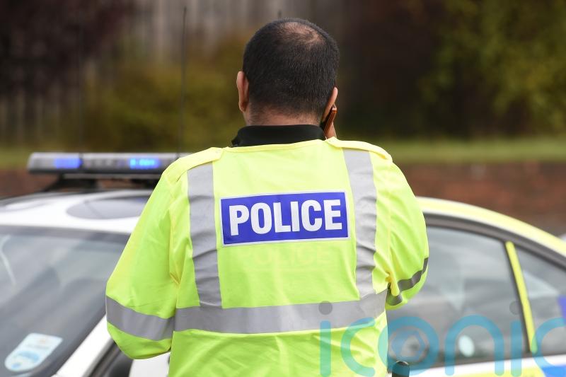 Passenger flown to hospital after car falls from bridge on to motorway