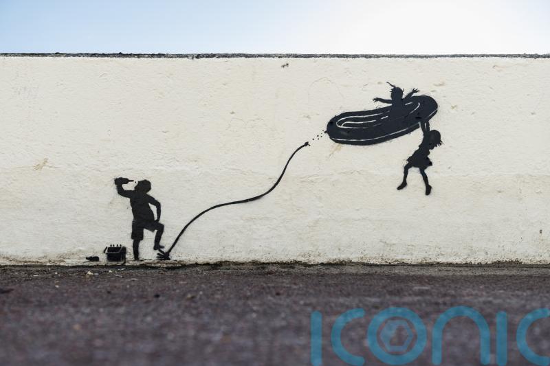 Banksy dinghy artwork to be moved from beach where girl was killed by inflatable