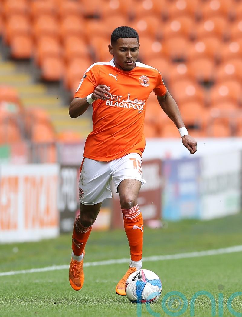 Hibernian sign former Hearts full-back Demetri Mitchell from Blackpool