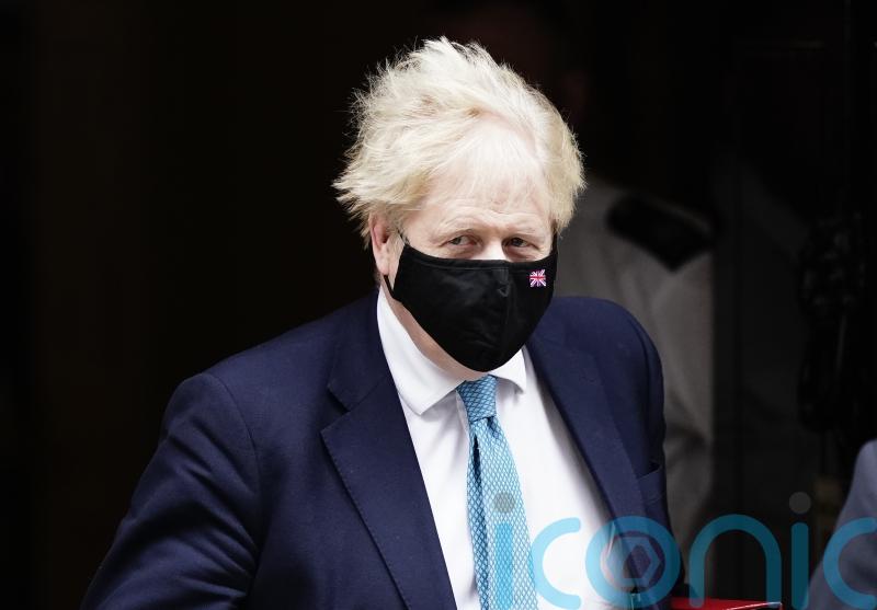Johnson insists &lsquo;I am getting on with the job&rsquo; as he awaits partygate report