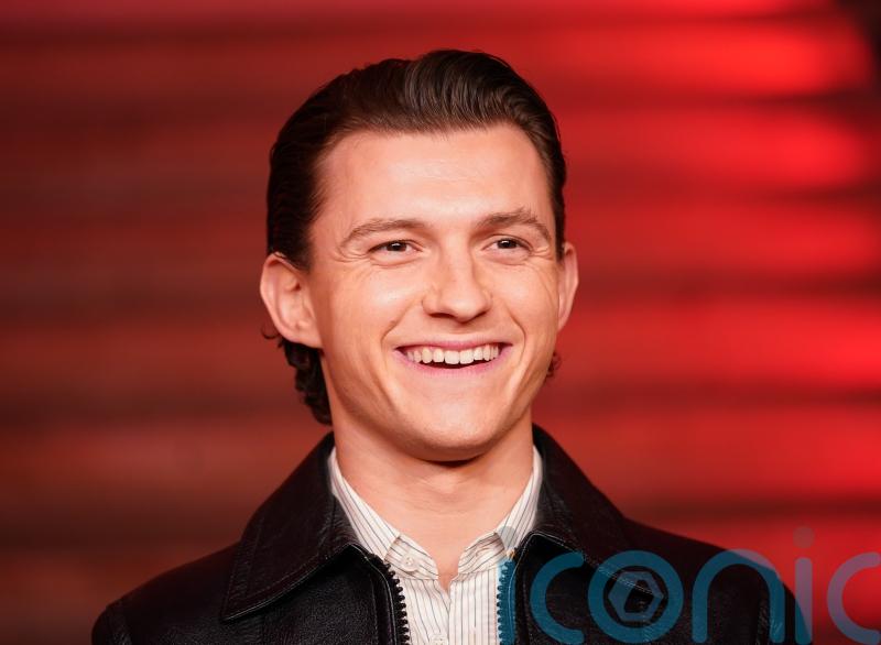 Tom Holland jokes about reprising Spiderman role if he needs money